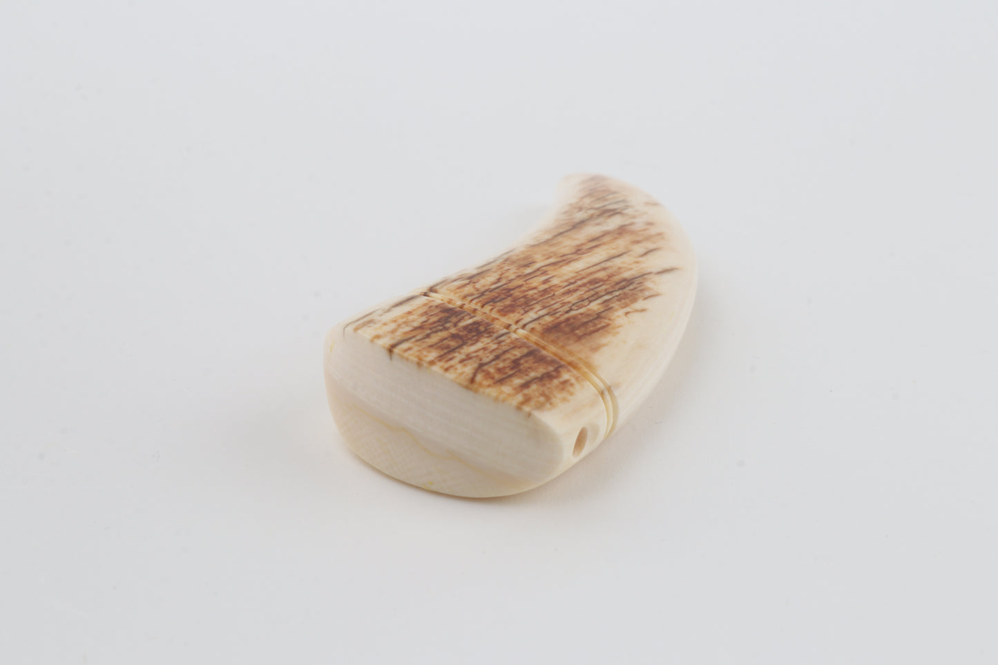 Carved mammoth ivory pendant