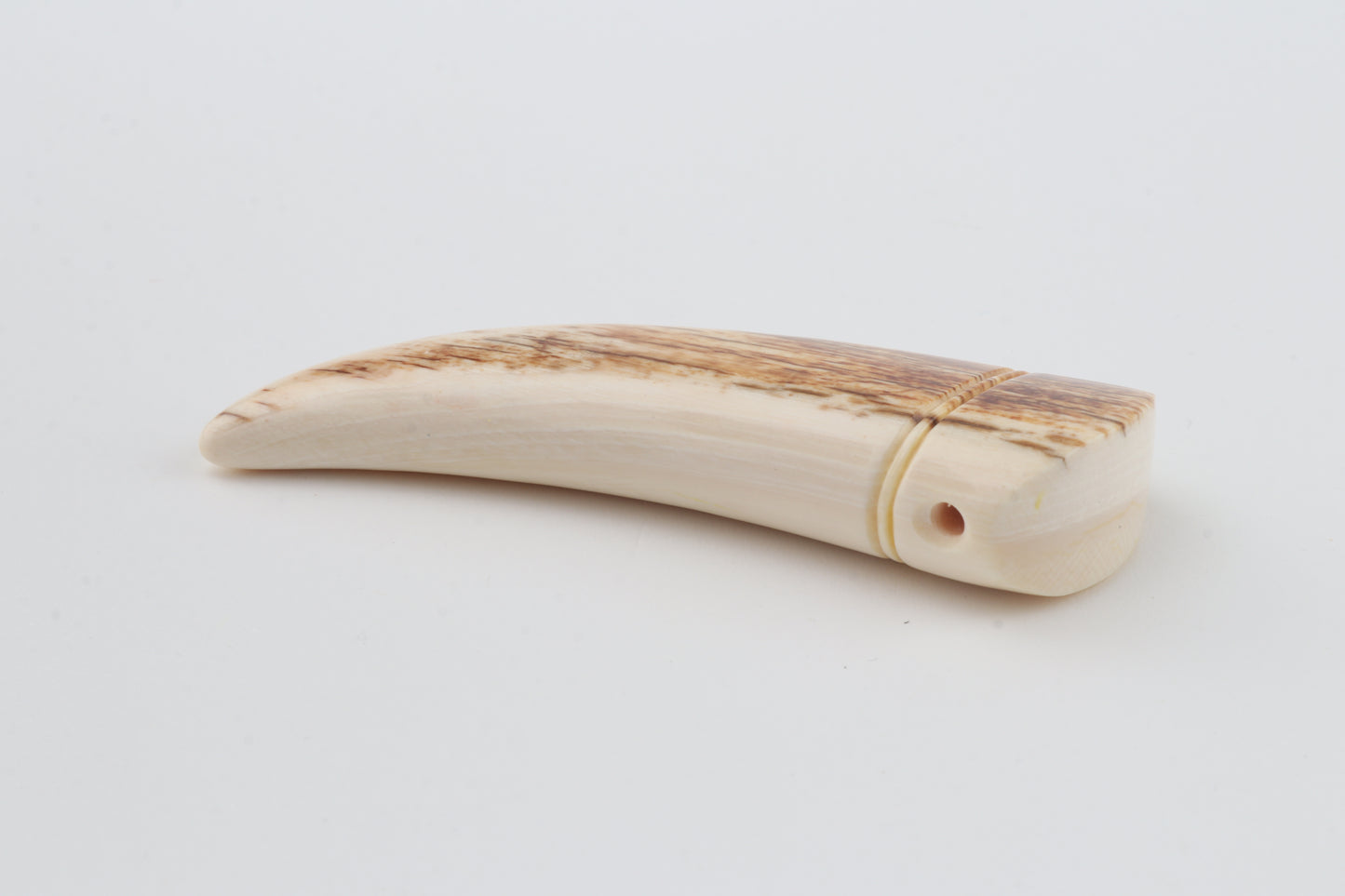 Carved mammoth ivory pendant