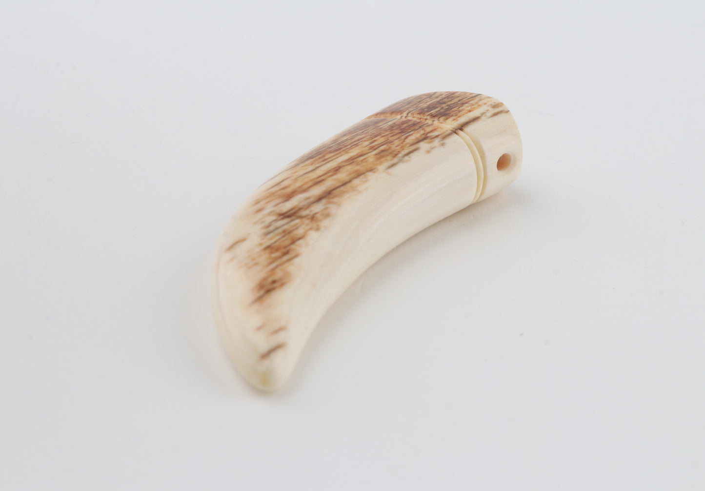 Carved mammoth ivory pendant