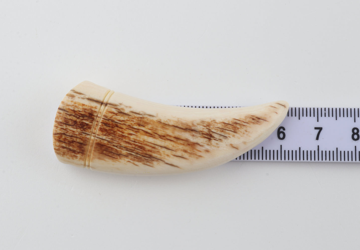 Carved mammoth ivory pendant