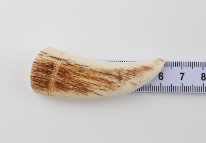 Carved mammoth ivory pendant