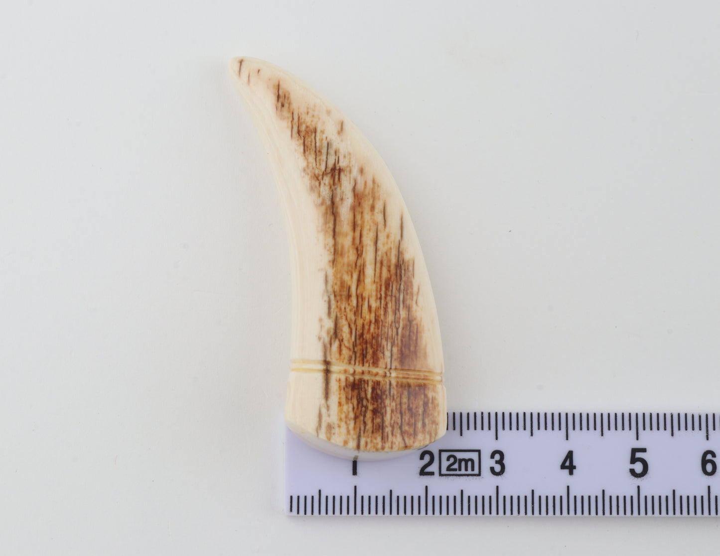 Carved mammoth ivory pendant