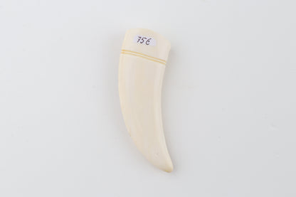 Carved mammoth ivory pendant