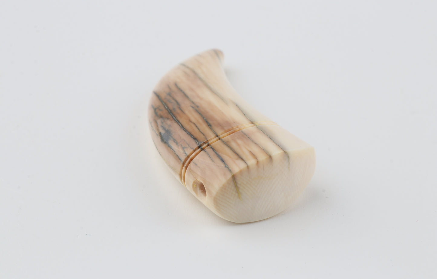 Carved mammoth ivory pendant