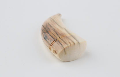 Carved mammoth ivory pendant
