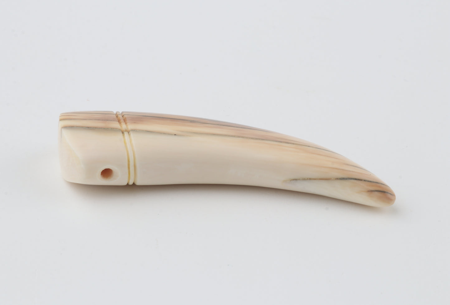 Carved mammoth ivory pendant