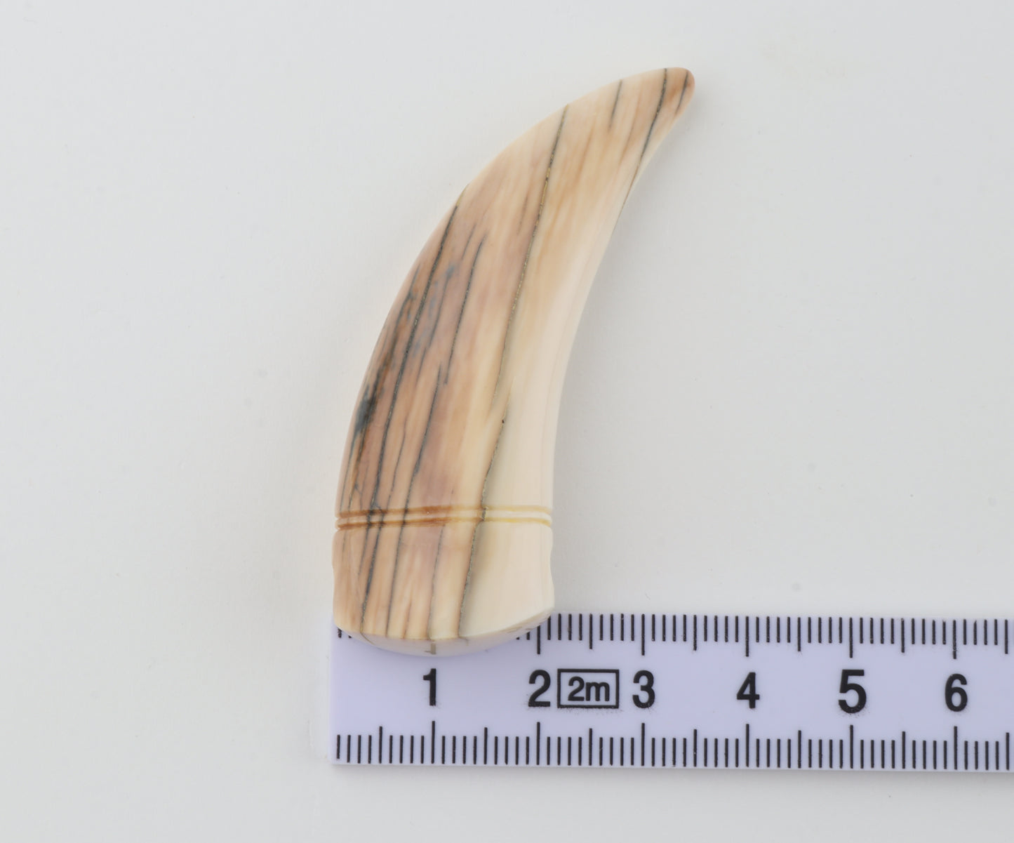 Carved mammoth ivory pendant