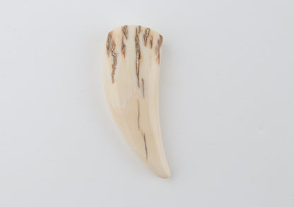 Carved mammoth ivory pendant