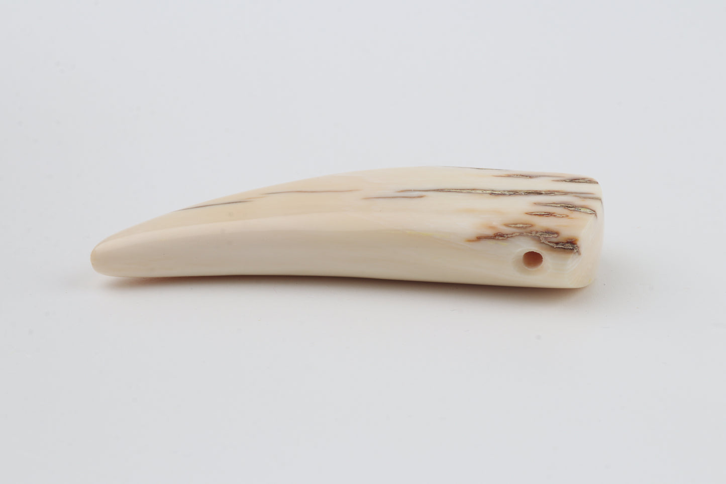 Carved mammoth ivory pendant