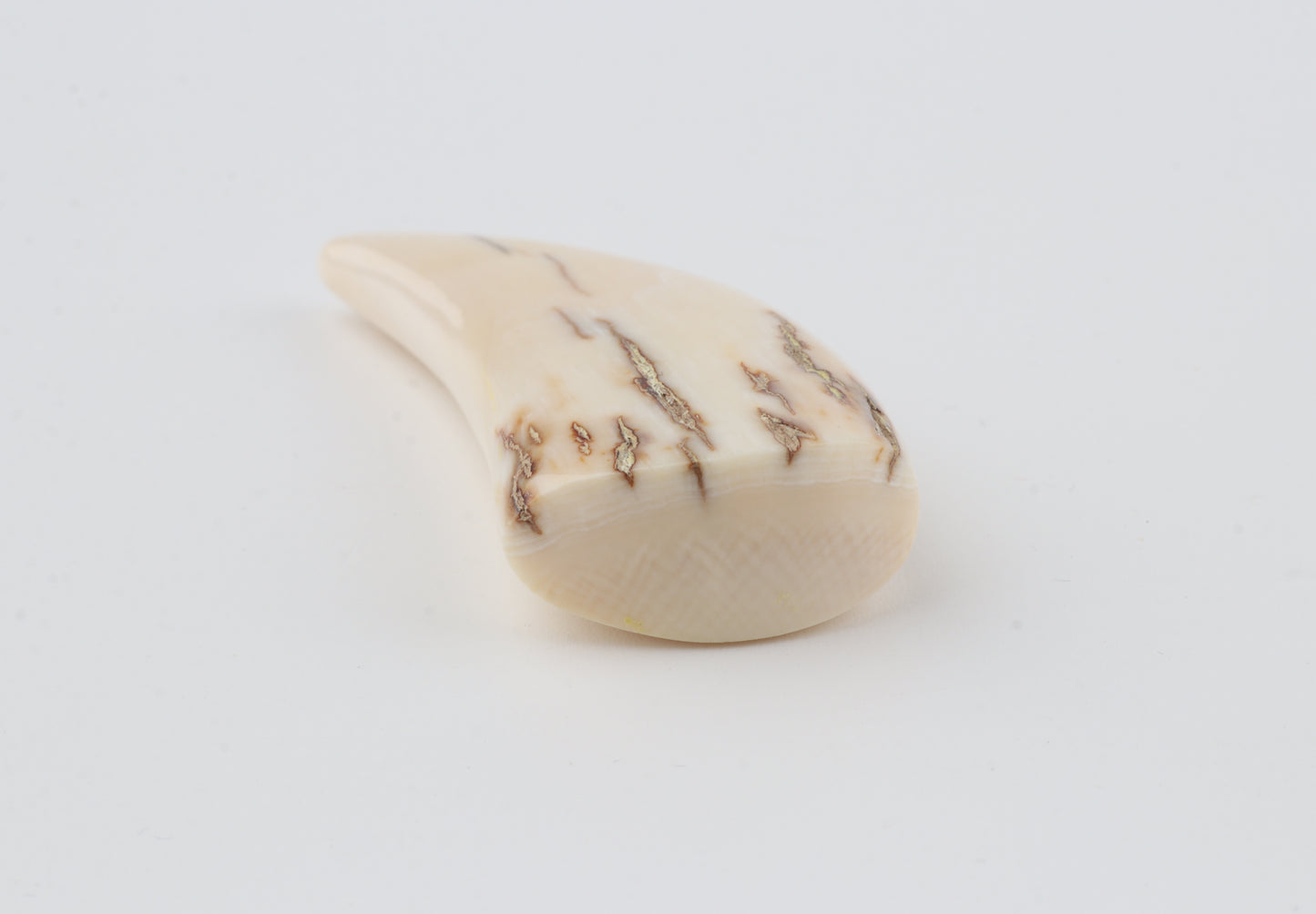 Carved mammoth ivory pendant