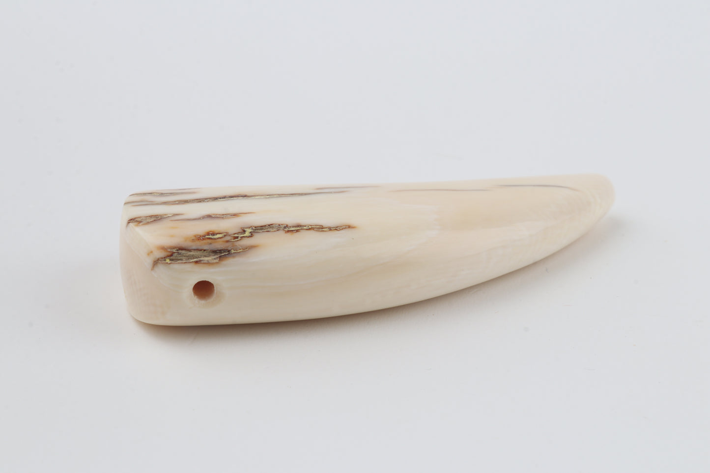 Carved mammoth ivory pendant