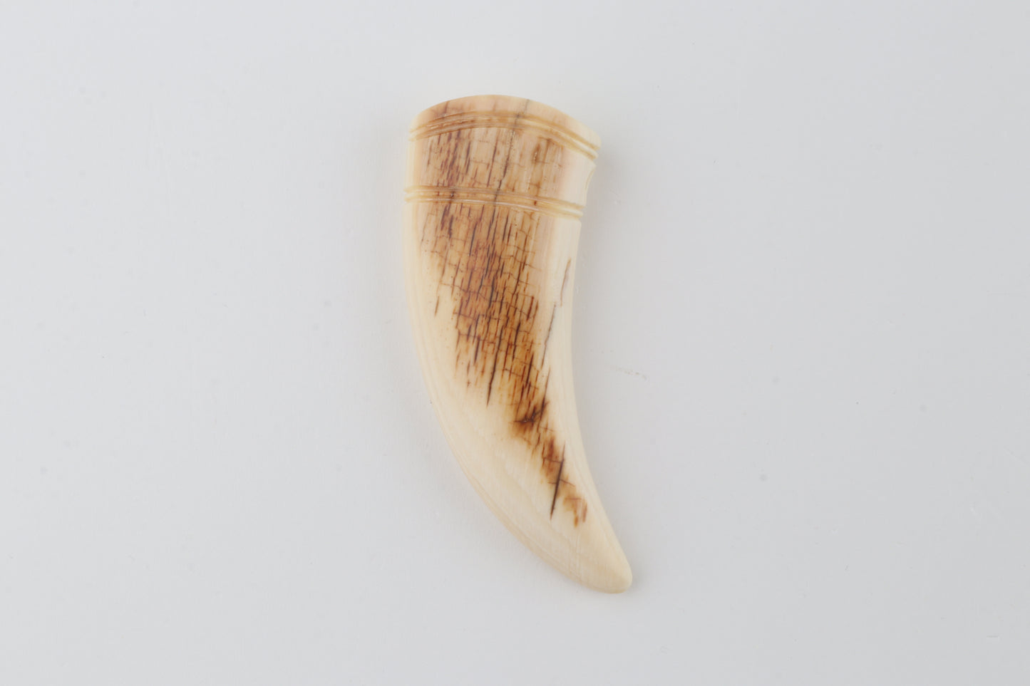 Carved mammoth ivory pendant