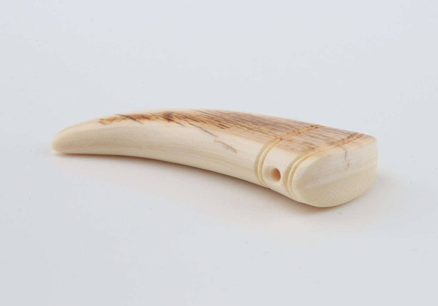 Carved mammoth ivory pendant