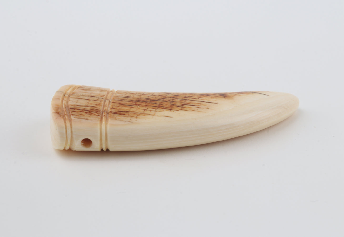 Carved mammoth ivory pendant