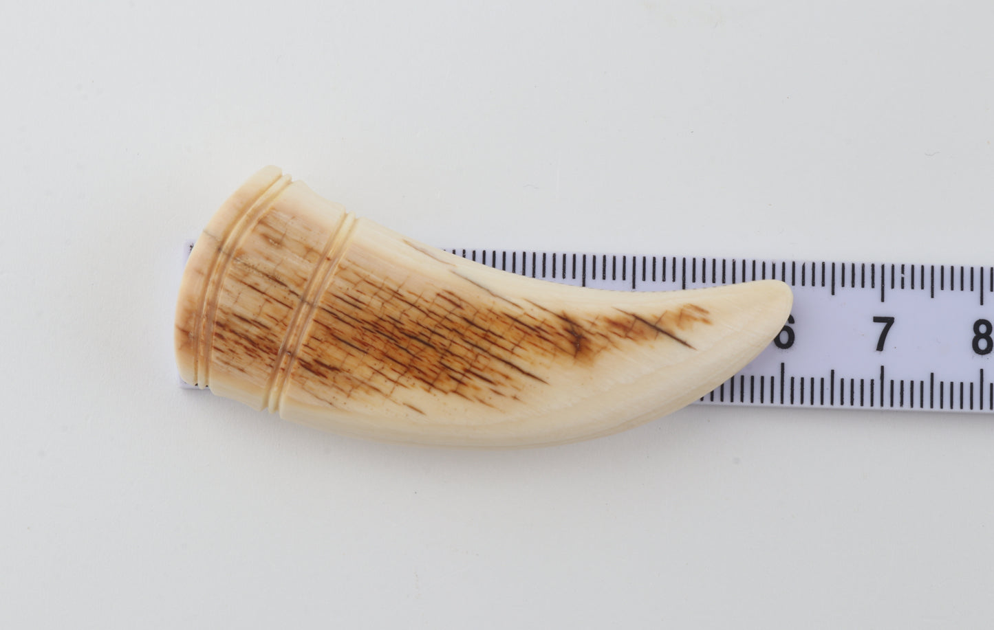 Carved mammoth ivory pendant