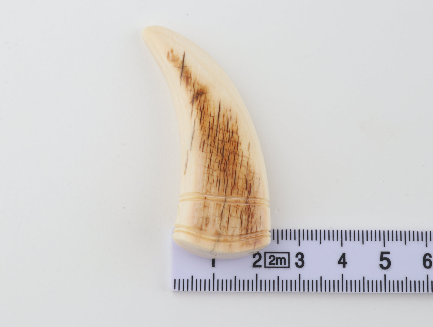 Carved mammoth ivory pendant