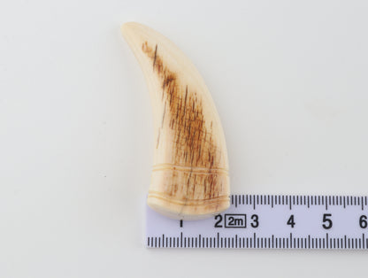 Carved mammoth ivory pendant