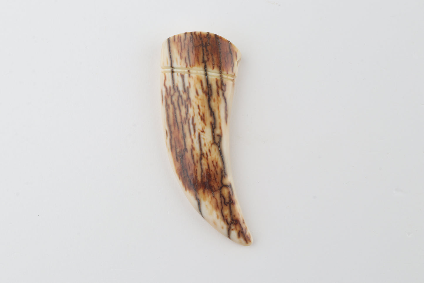 Carved mammoth ivory pendant