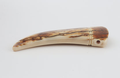 Carved mammoth ivory pendant