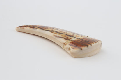 Carved mammoth ivory pendant