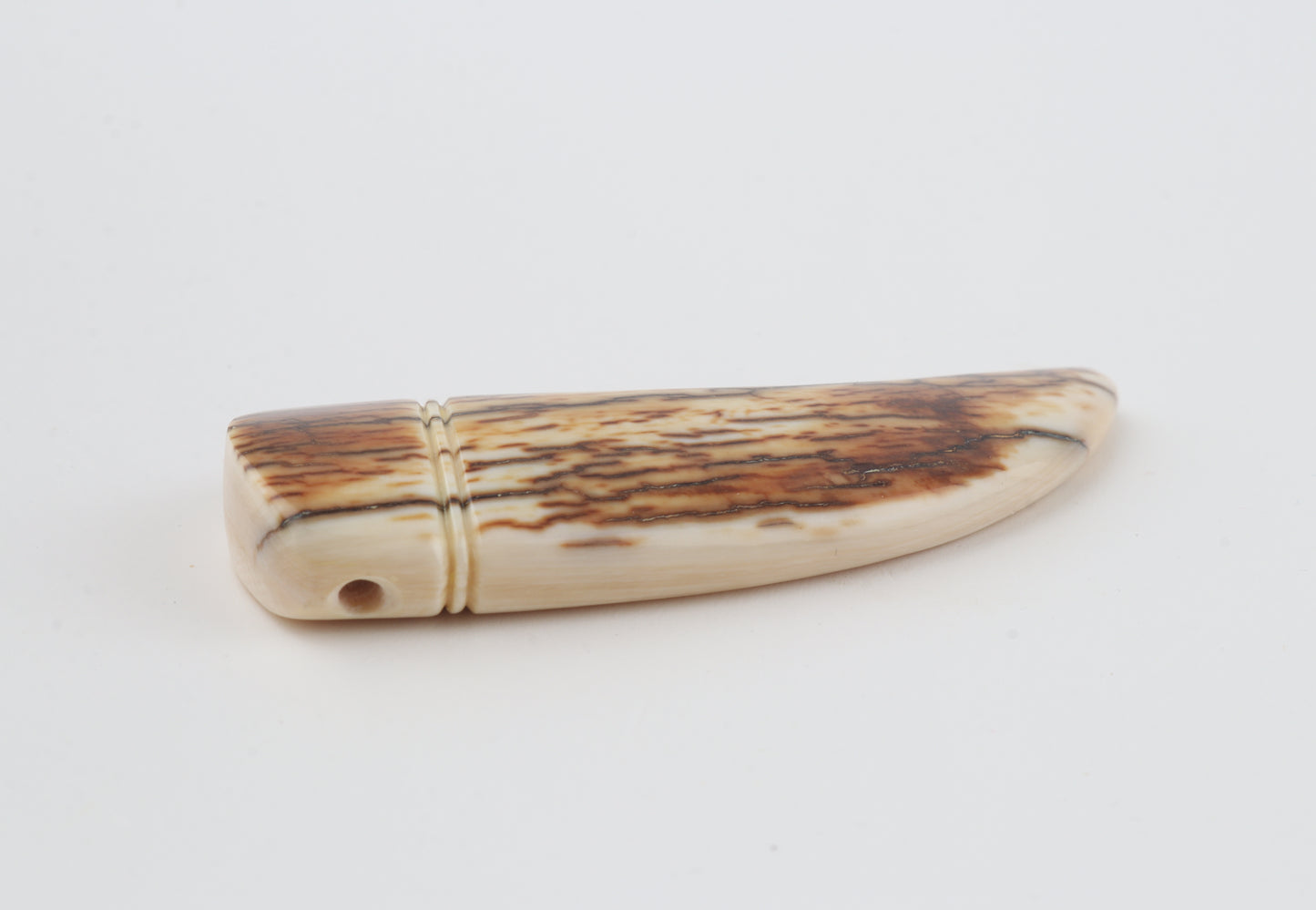 Carved mammoth ivory pendant