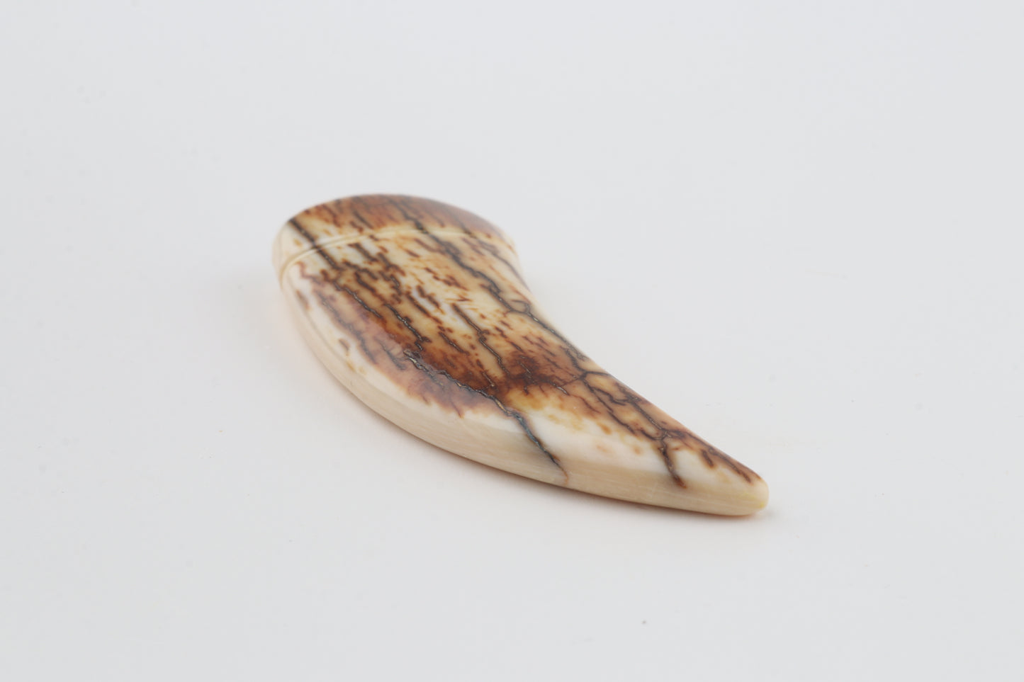 Carved mammoth ivory pendant