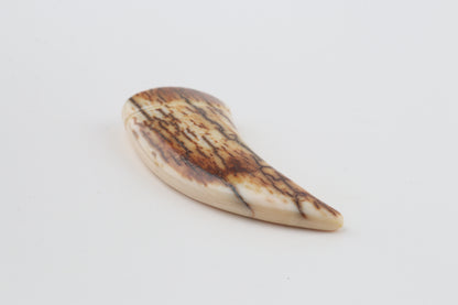 Carved mammoth ivory pendant