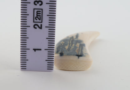 Carved mammoth ivory pendant