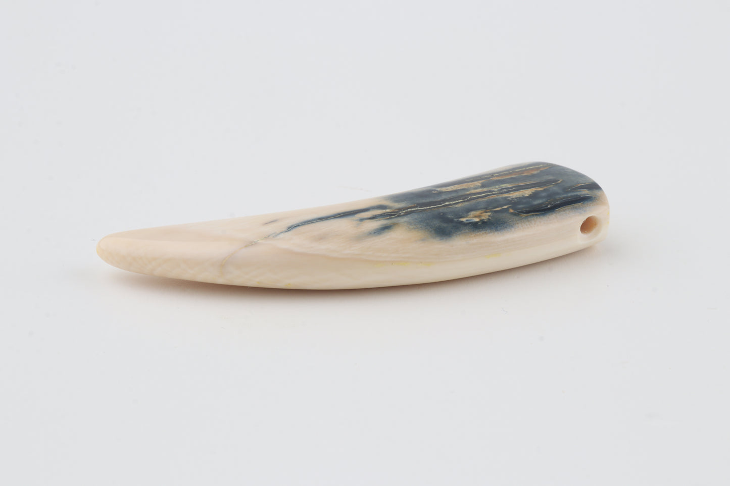 Carved mammoth ivory pendant
