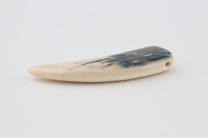 Carved mammoth ivory pendant
