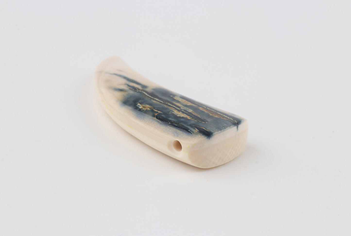 Carved mammoth ivory pendant