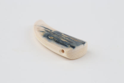 Carved mammoth ivory pendant