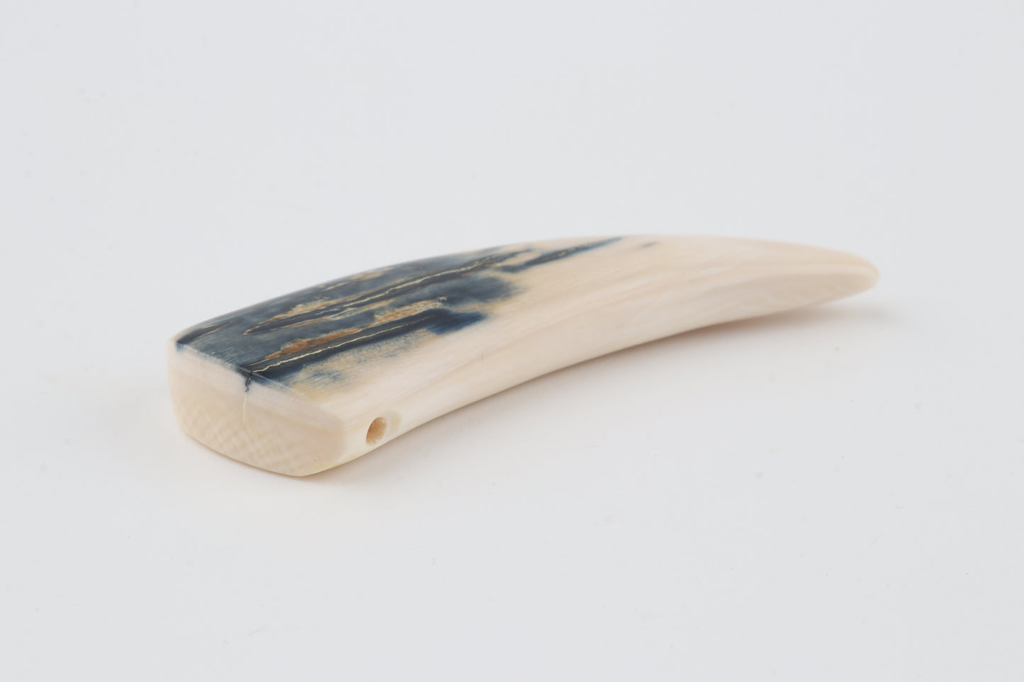 Carved mammoth ivory pendant