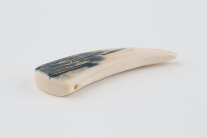 Carved mammoth ivory pendant