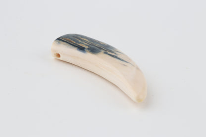 Carved mammoth ivory pendant