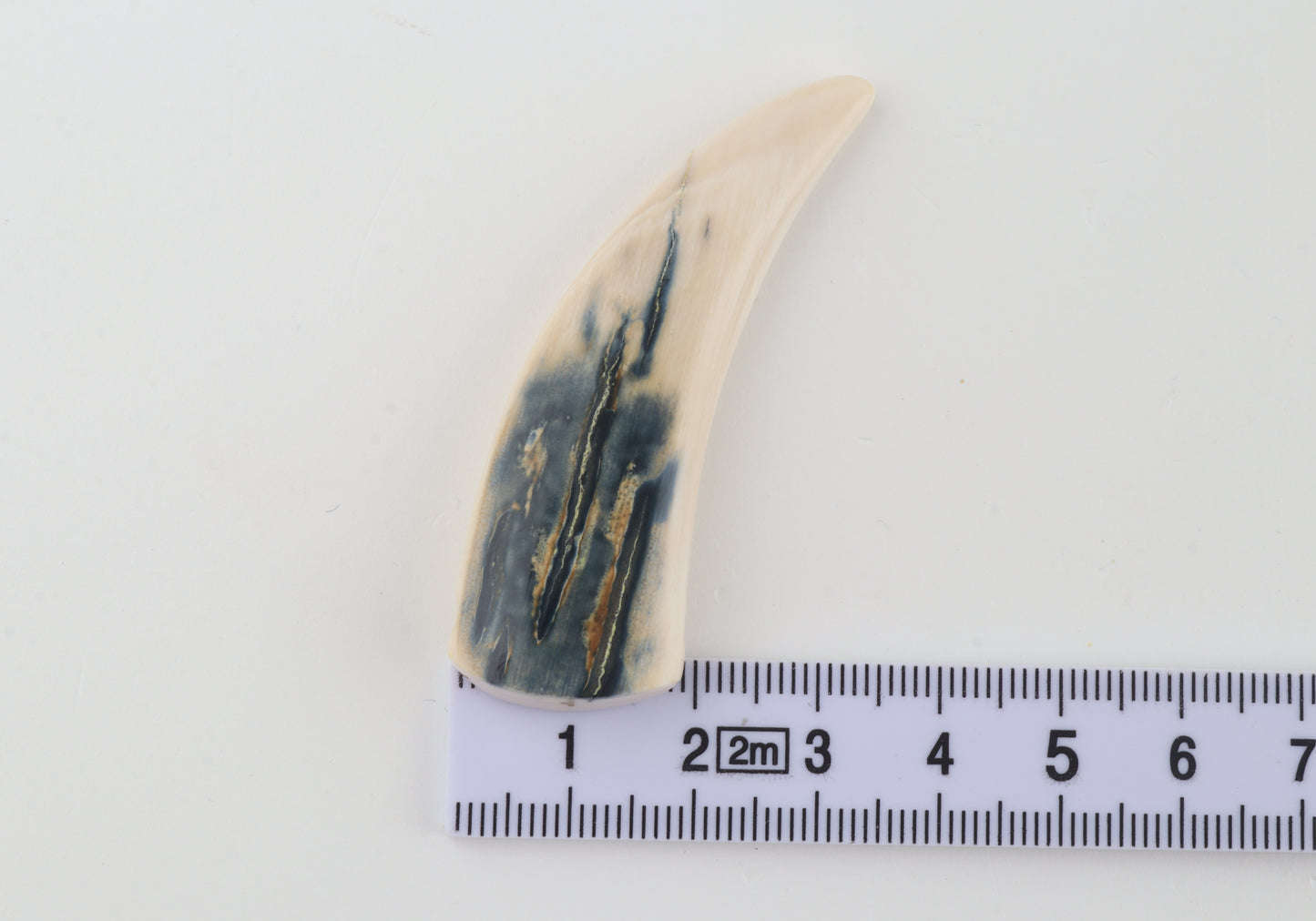 Carved mammoth ivory pendant