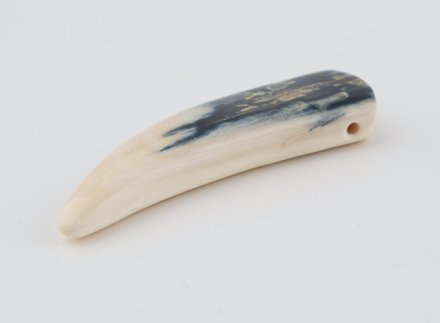 Carved mammoth ivory pendant