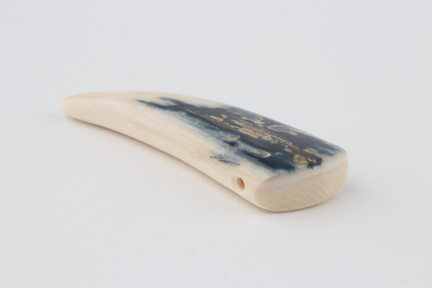 Carved mammoth ivory pendant