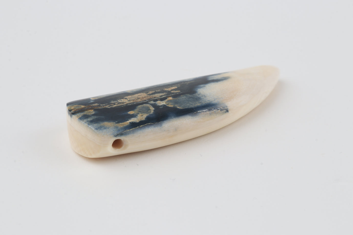 Carved mammoth ivory pendant