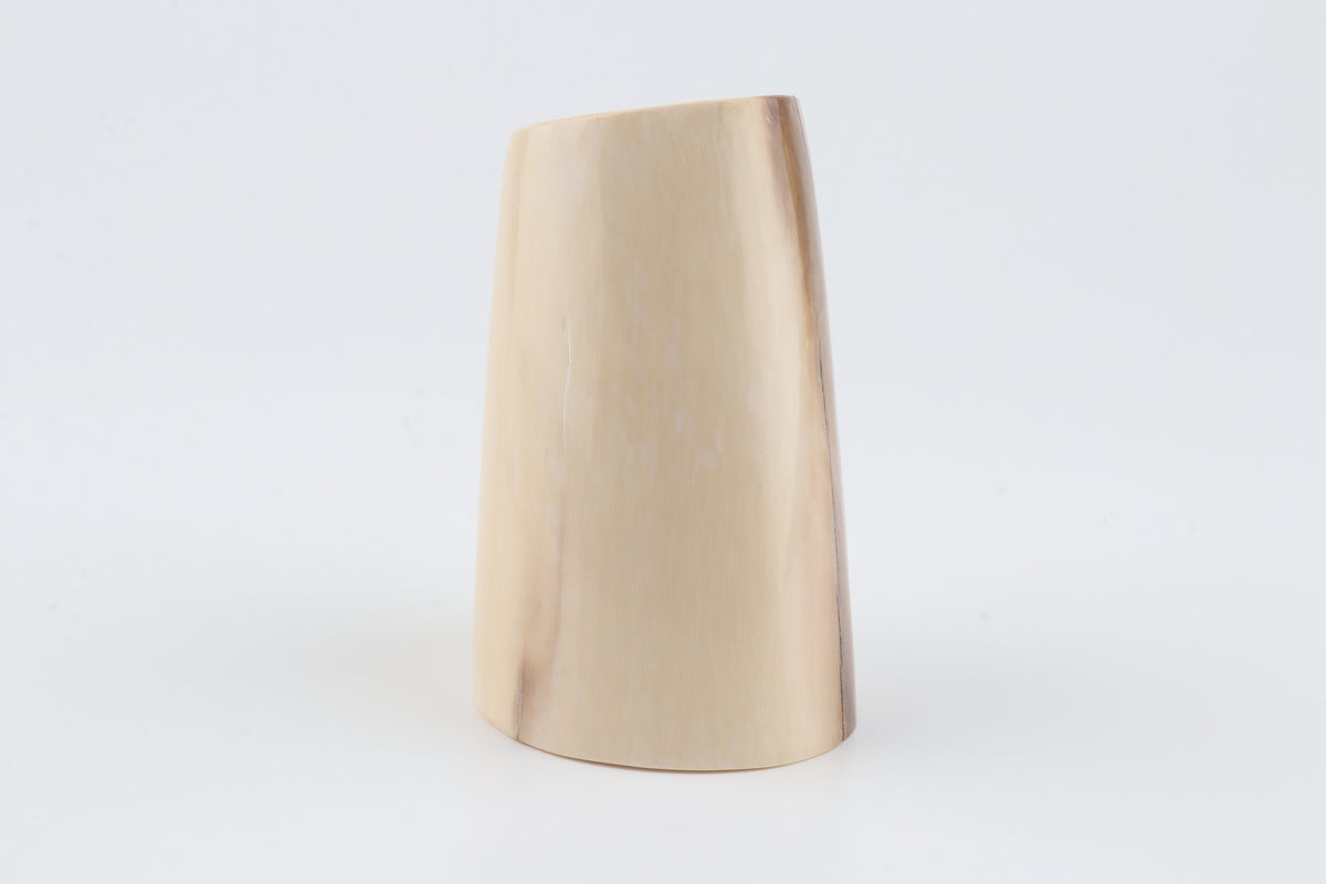 Round mammoth ivory piece