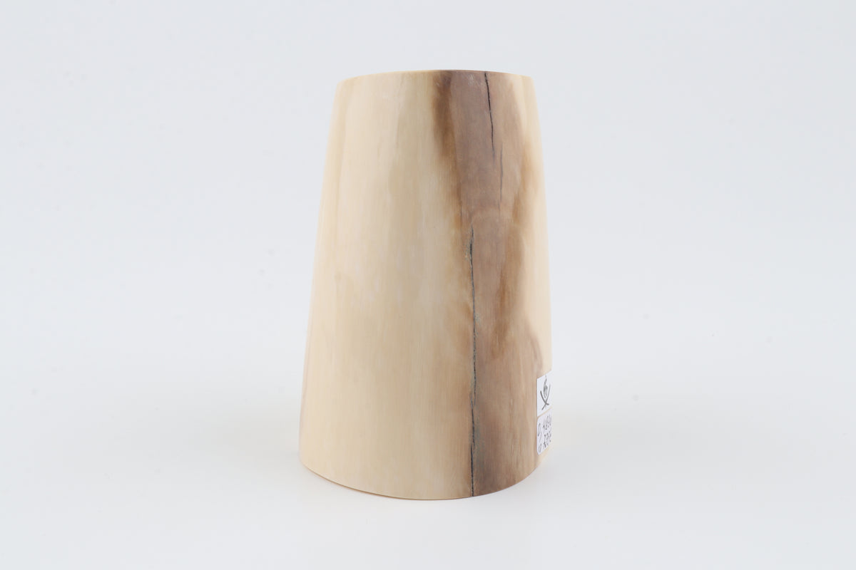 Round mammoth ivory piece