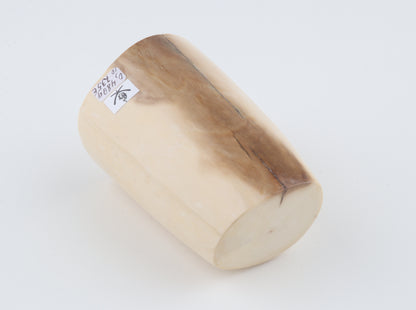Round mammoth ivory piece