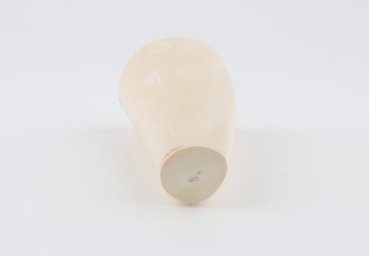 Round mammoth tusk piece