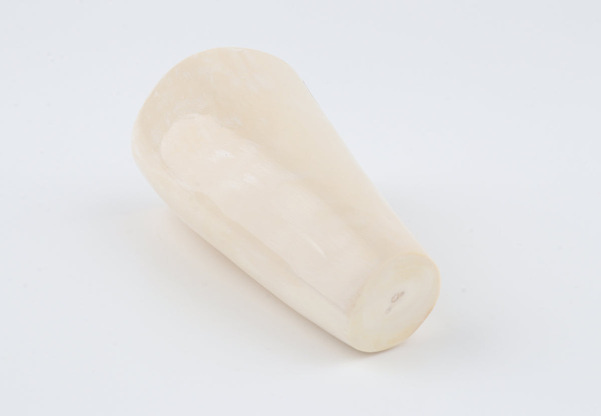 Round mammoth tusk piece