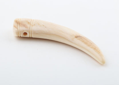 Carved mammoth ivory pendant