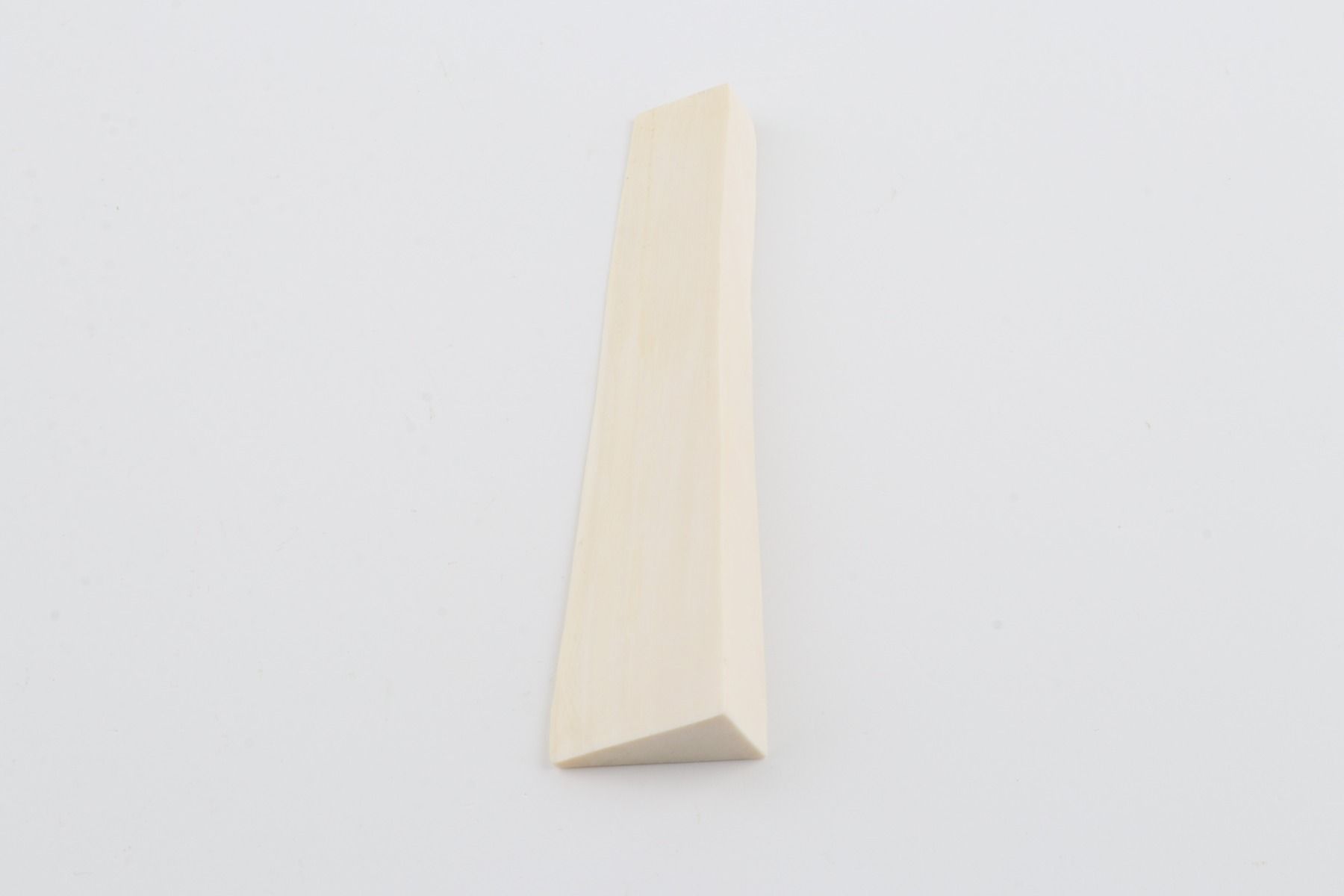 White mammoth ivory piece