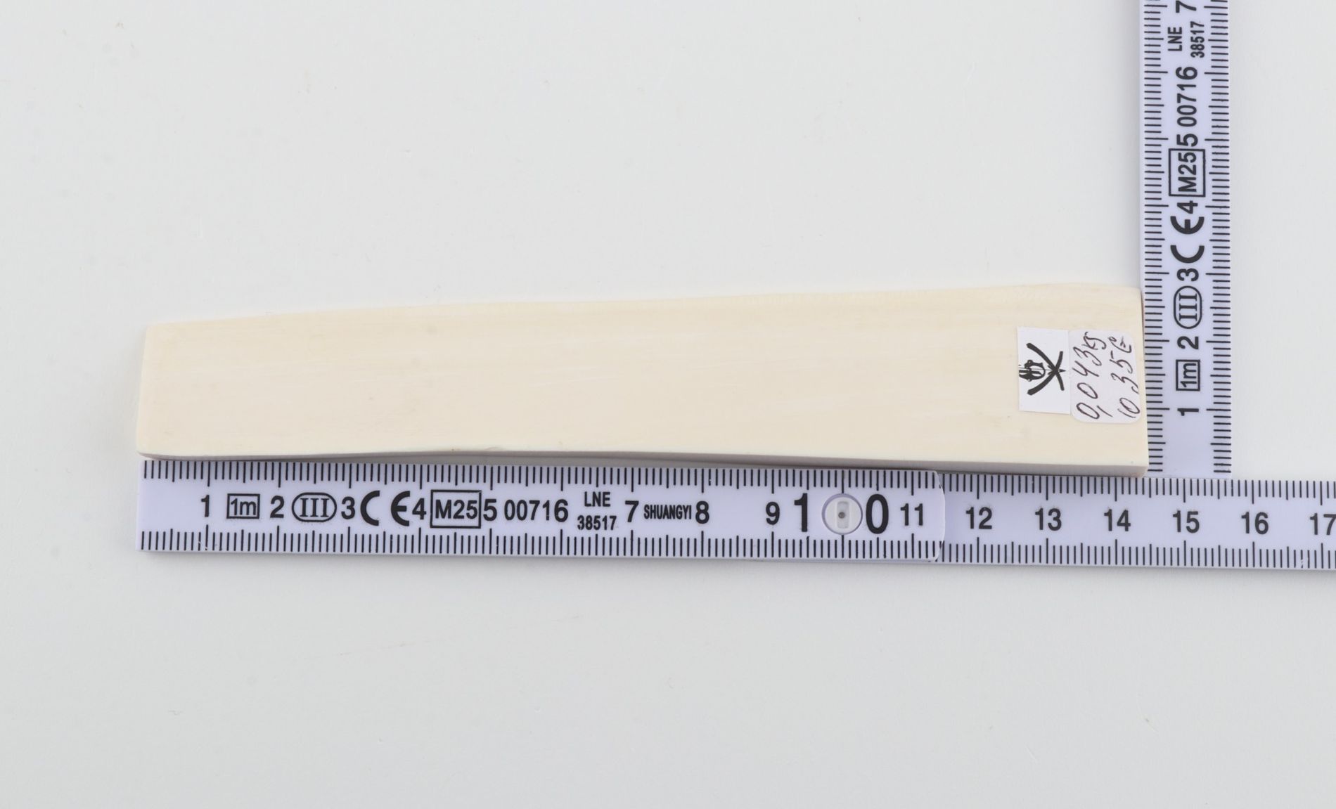 White mammoth ivory piece