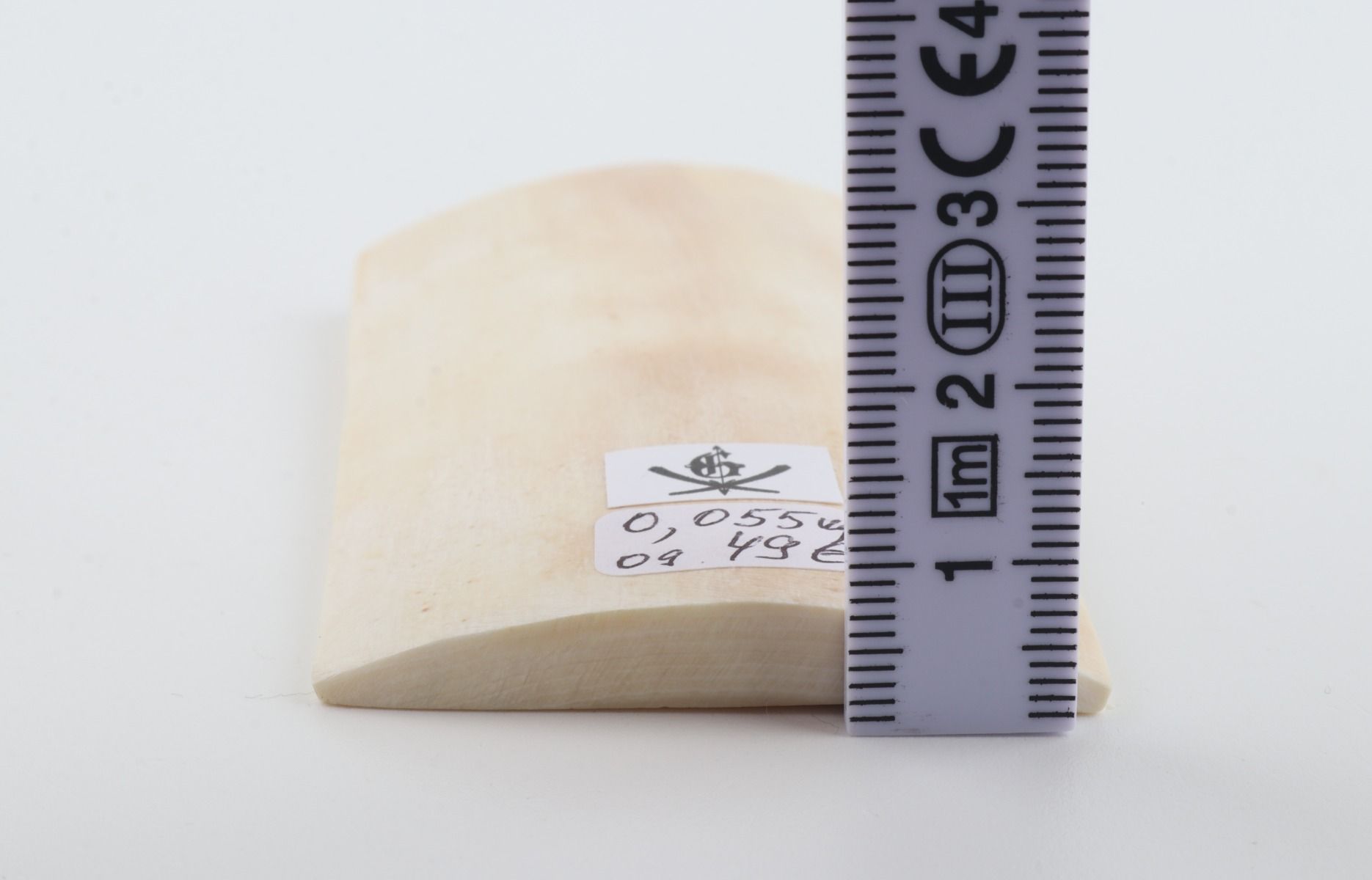 White mammoth ivory piece