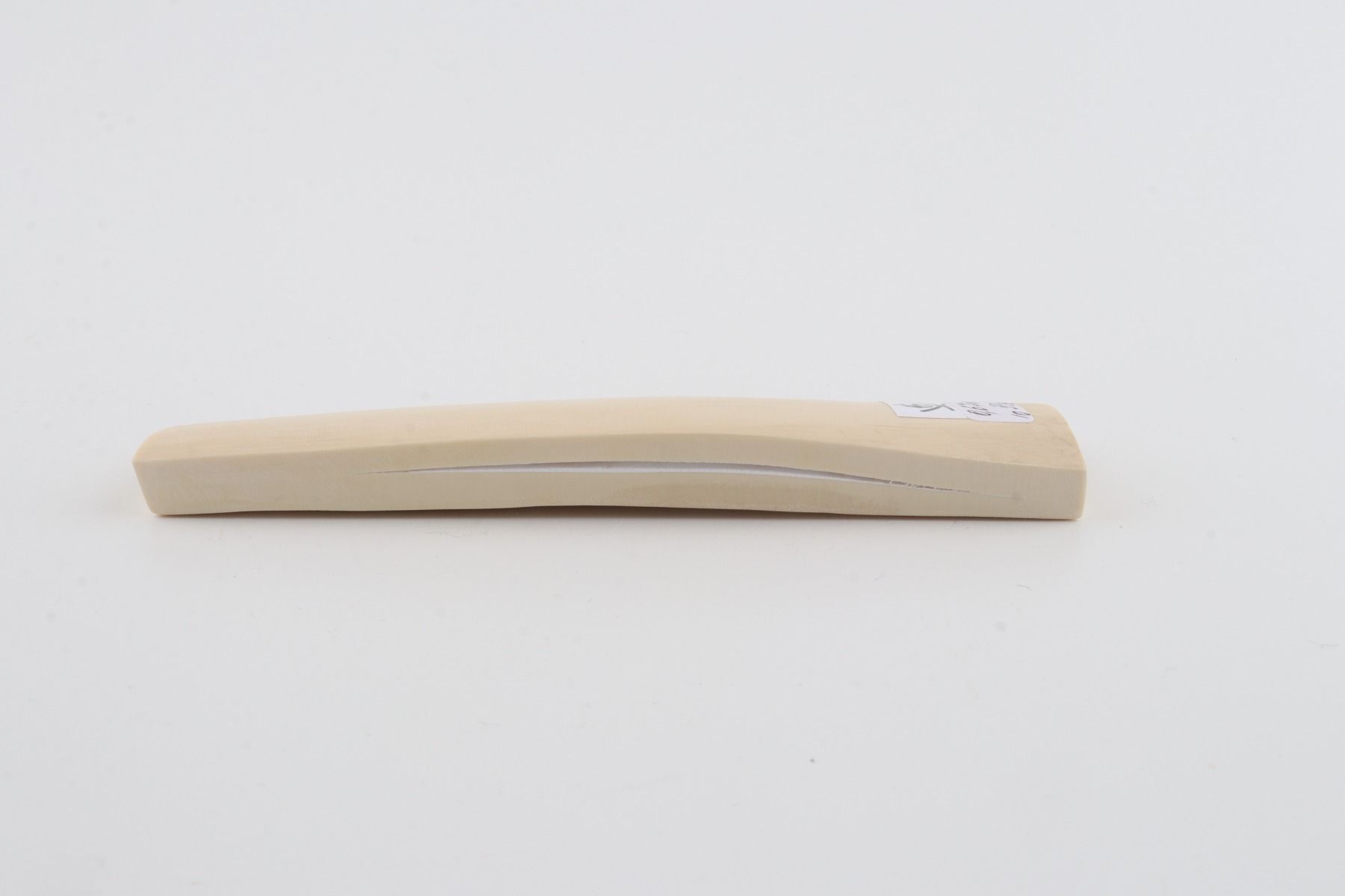 White mammoth ivory piece