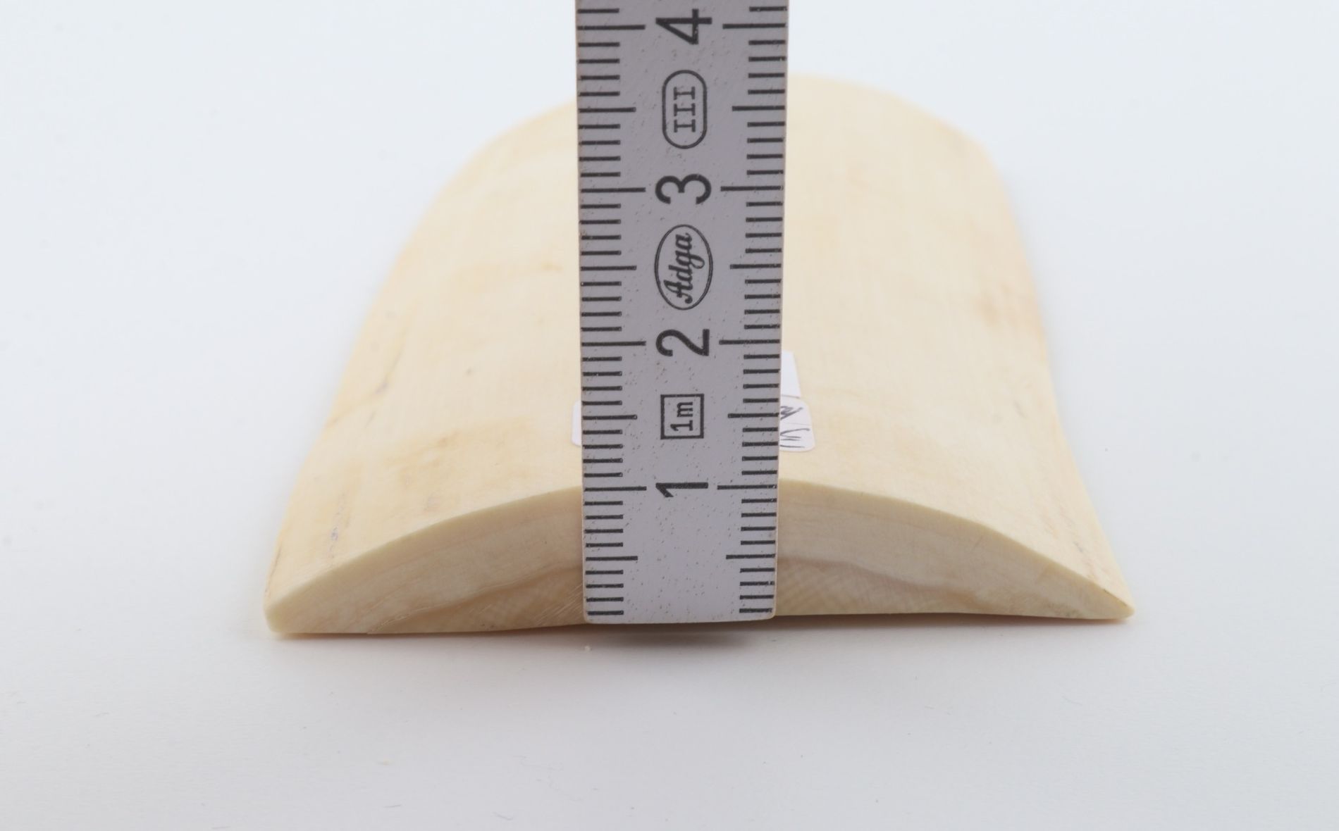 White mammoth ivory piece